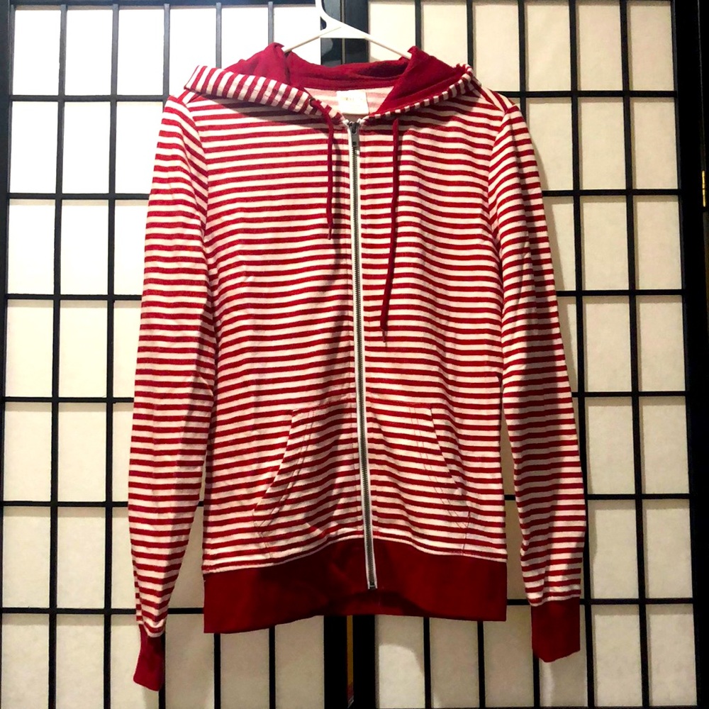 A red and white zipper hoodie